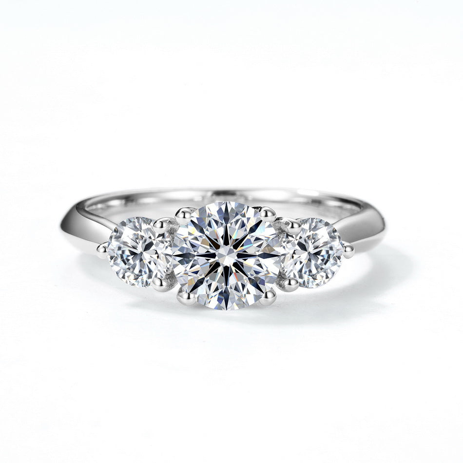 Classic three-stone diamond accent past present future ring in 925 sterling silver.