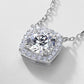 Close-up view of openwork gallery and integrated chain on cushion halo diamond pendant.