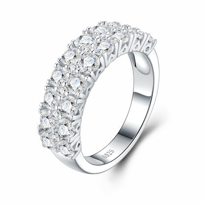 Double row half eternity moissanite wedding band in 925 sterling silver, angled view.