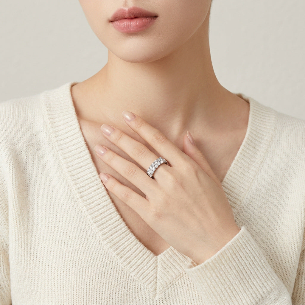 Model wearing the light luxury double row moissanite half eternity ring in a lifestyle setting.