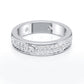 Double row pavé moissanite full eternity band ring in sterling silver, white background product view.