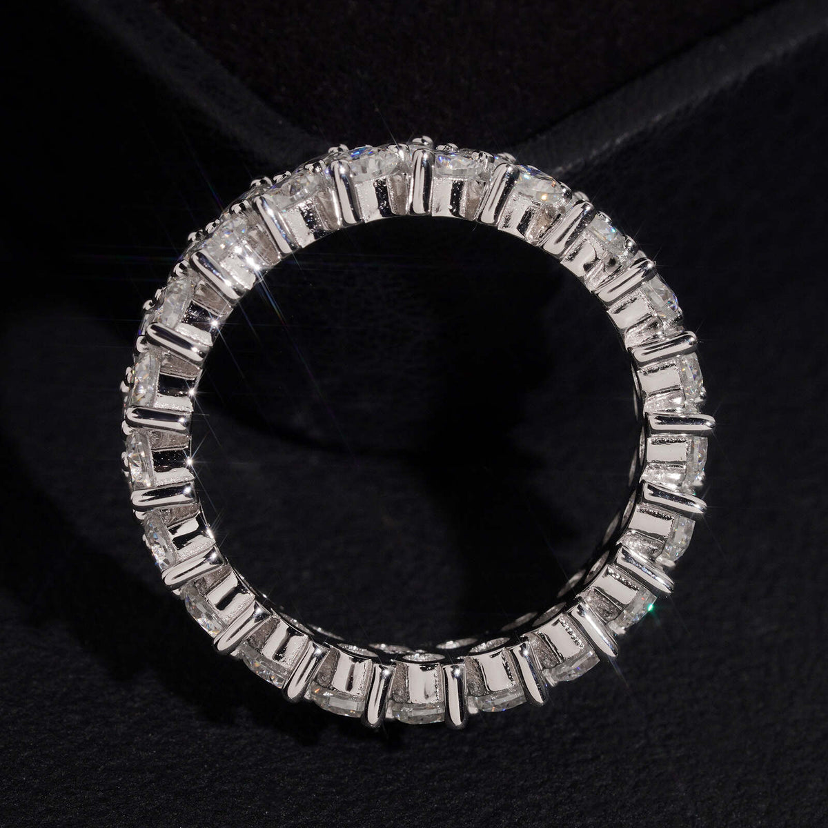 Top view showing circle profile of double row round moissanite full eternity ring
