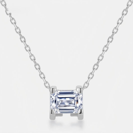 East-West emerald cut lab grown diamond solitaire pendant necklace in 925 sterling silver.