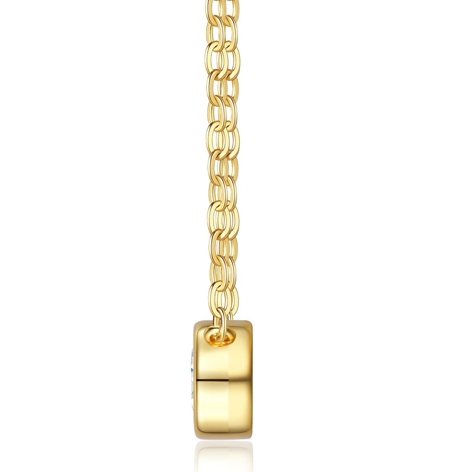 Side profile of gold east-west oval bezel pendant, highlighting sleek and low-profile design
