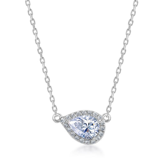 East-west pear cut moissanite halo pendant necklace in sterling silver isolated on white background