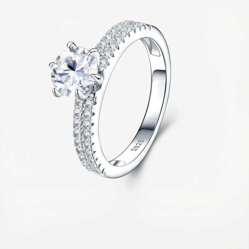 Three-quarter studio perspective of an effortless luxury d vvs1 brilliant cut moissanite anniversary band with double pave shank.