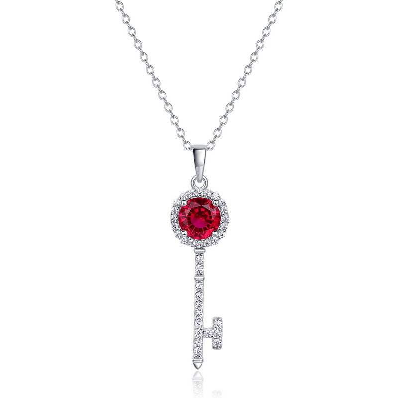 Elegant ruby secret sovereign key pendant necklace featuring a round-cut red gemstone with diamond halo.