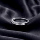 Side profile shot of 1.45ct emerald cut lab diamond half eternity band ring.