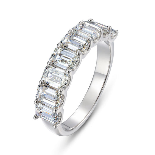 Emerald cut lab grown diamond 7-stone half eternity wedding band in platinum plated 925 silver.