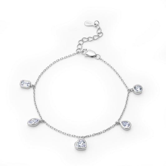 Fancy cut lab grown diamond bezel set floating charm chain bracelet in 925 sterling silver.