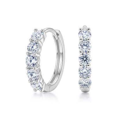 Five stone round cut lab grown diamond huggie hoop earrings in sterling silver isolated on white background