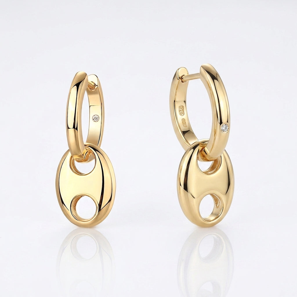 Pair of classic gold anchor link drop huggie earrings with hinged clicker closure.