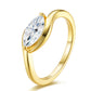 Studio perspective display highlighting the half-bezel setting and brilliant marquise moissanite brilliance.