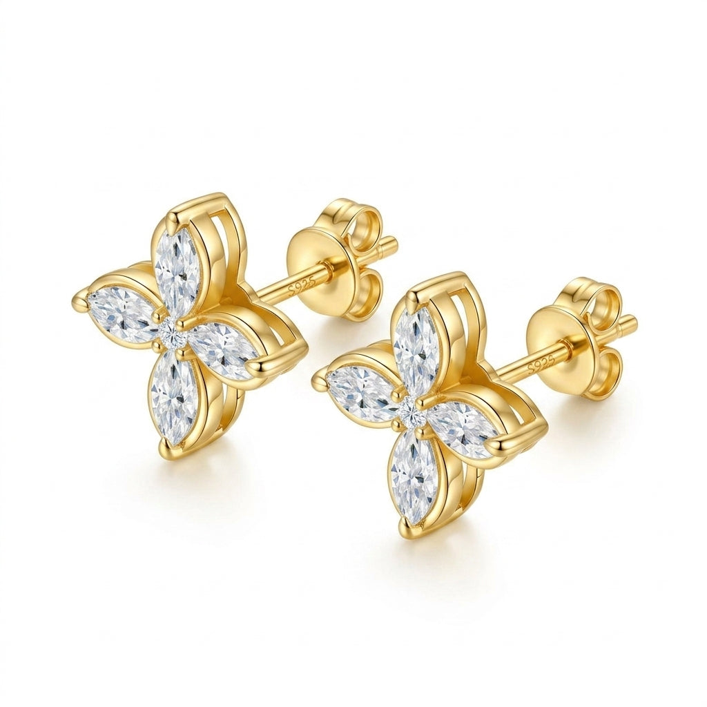 Pair of gold marquise cut moissanite four-leaf clover stud earrings showing post back closure.
