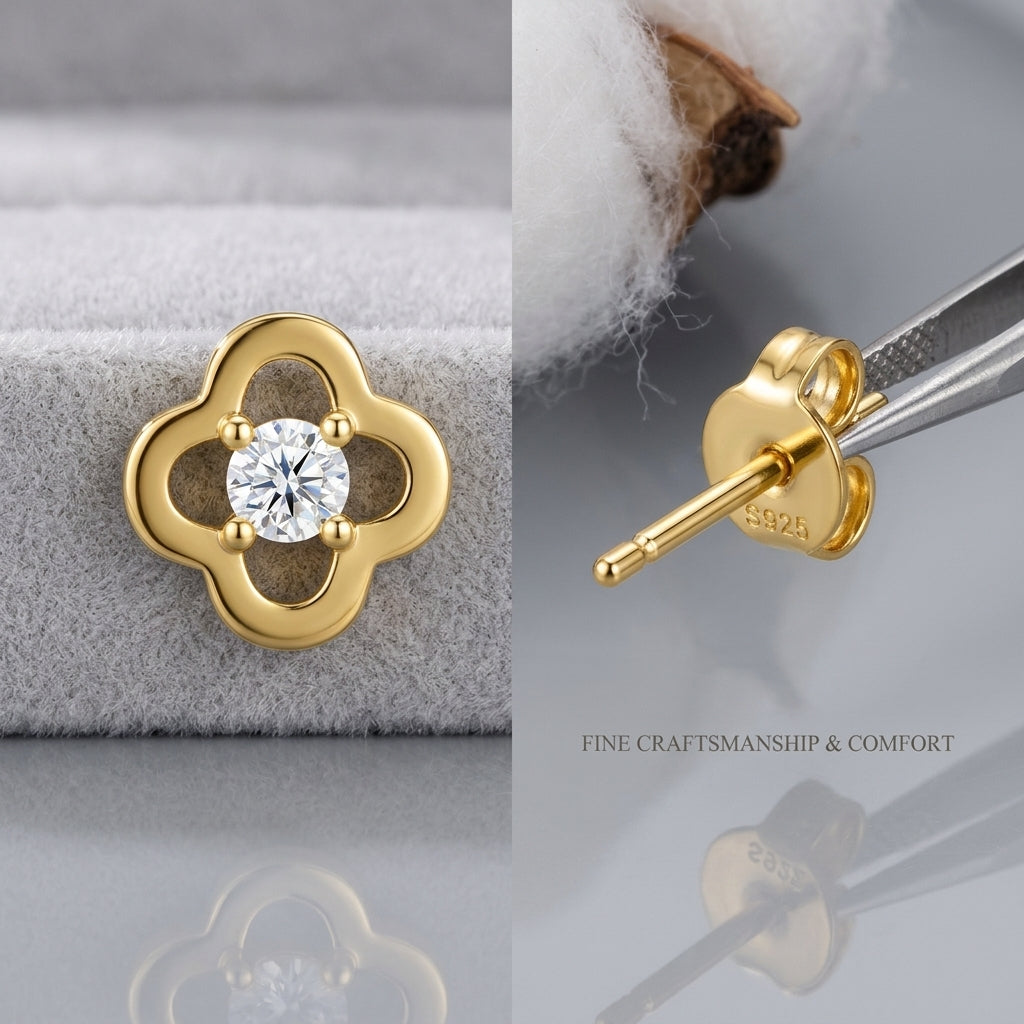 Macro close-up showing gold clover stud earring post, friction butterfly back, and S925 hallmark.
