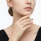 Model showcasing gold marquise moissanite crown tiara ring in a studio portrait.