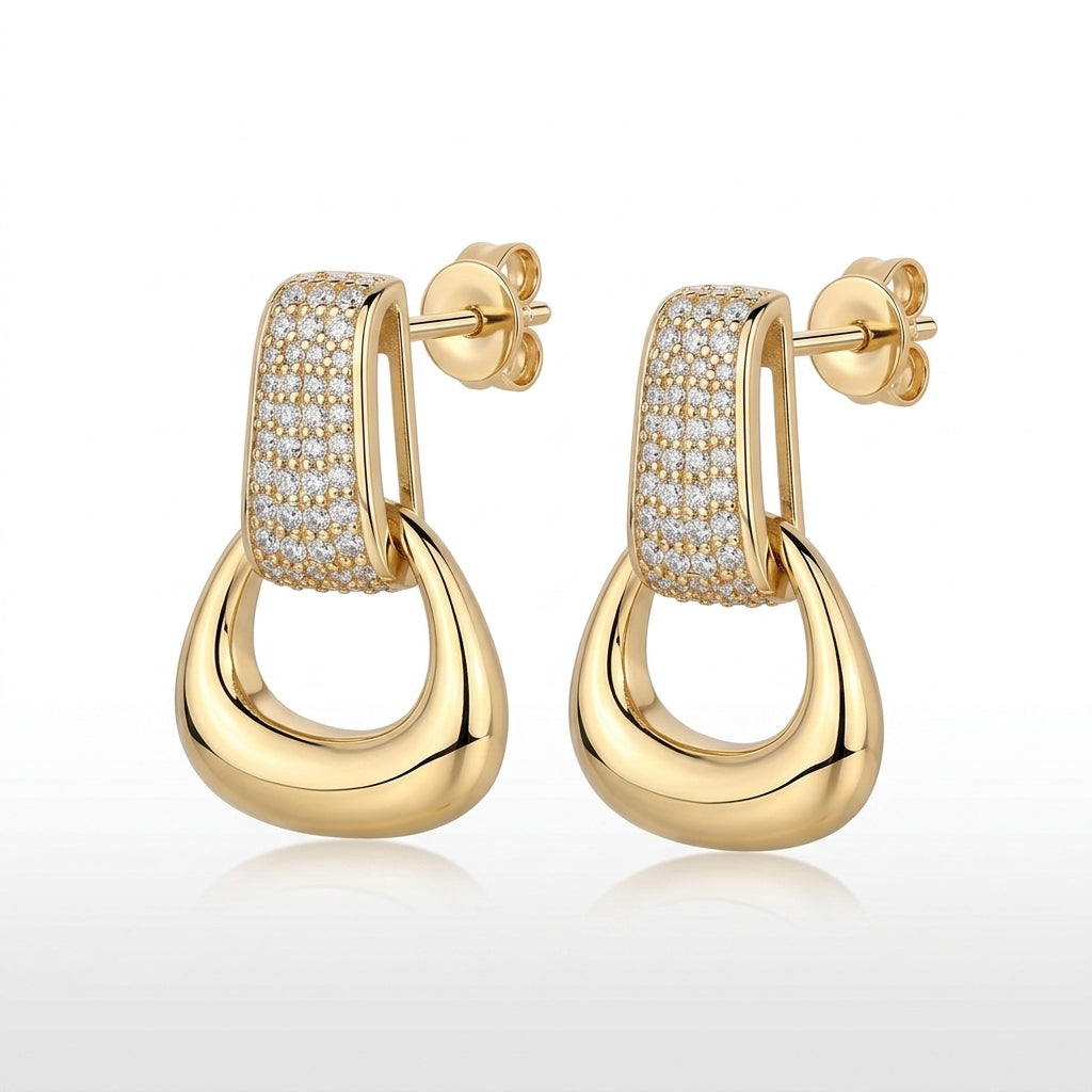 Pair of gold pavé moissanite stirrup door knocker earrings showing post back closure.