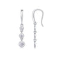 Front and side profile showing French wire hooks on graduated three stone bezel moissanite drop earrings.