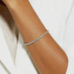 Model wearing graduated bezel round lab-grown diamond tennis bracelet.