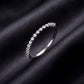 Slim half eternity lab grown diamond wedding band set on dark black silk fabric