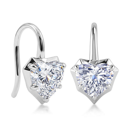 Perspective view of heart cut moissanite shepherd hook drop earrings on light background.