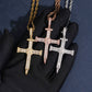 Hand wearing black glove holding S925 silver iced out moissanite baguette cross hip hop pendants