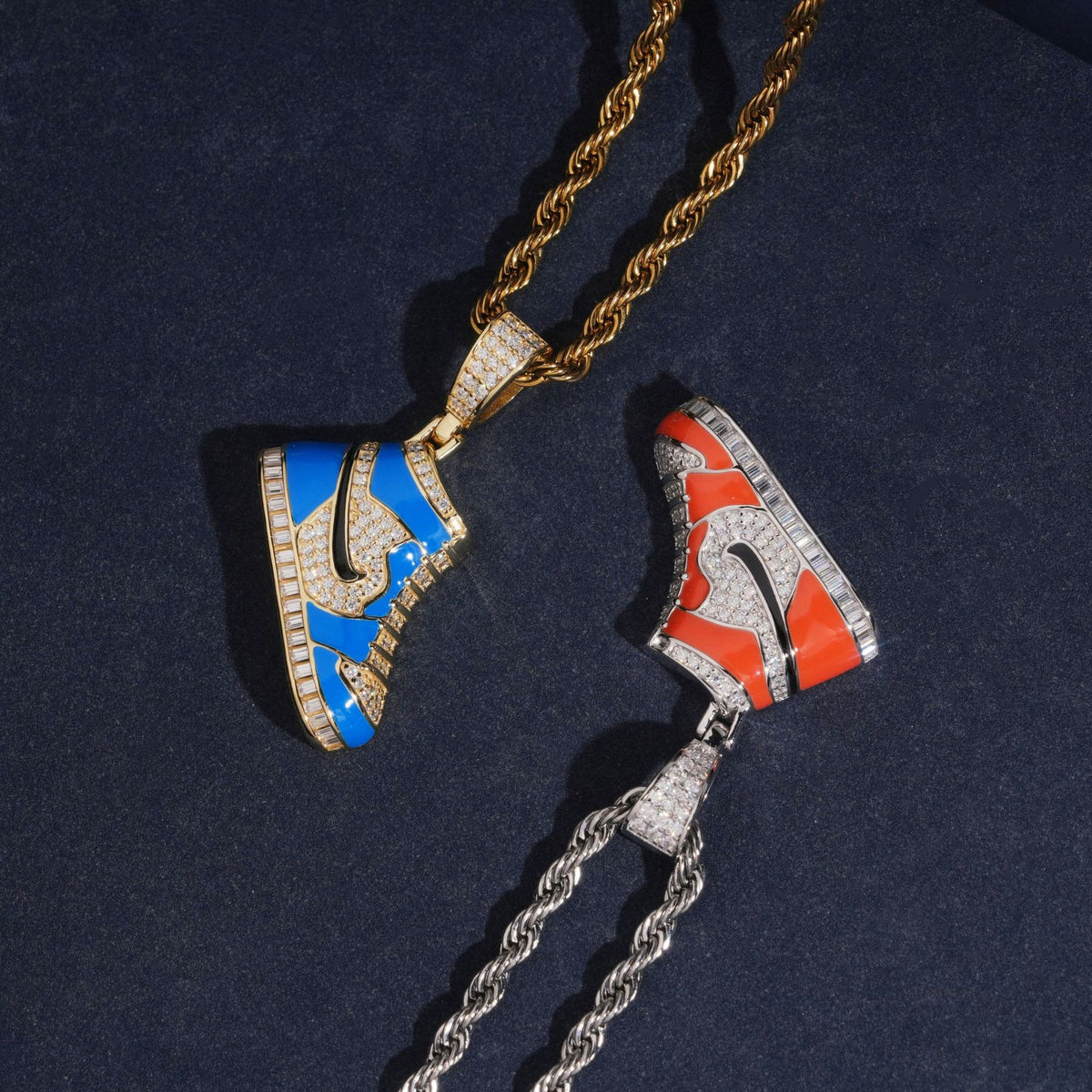 Hip hop S925 silver iced out moissanite enamel sneaker pendants in blue and orange on dark background