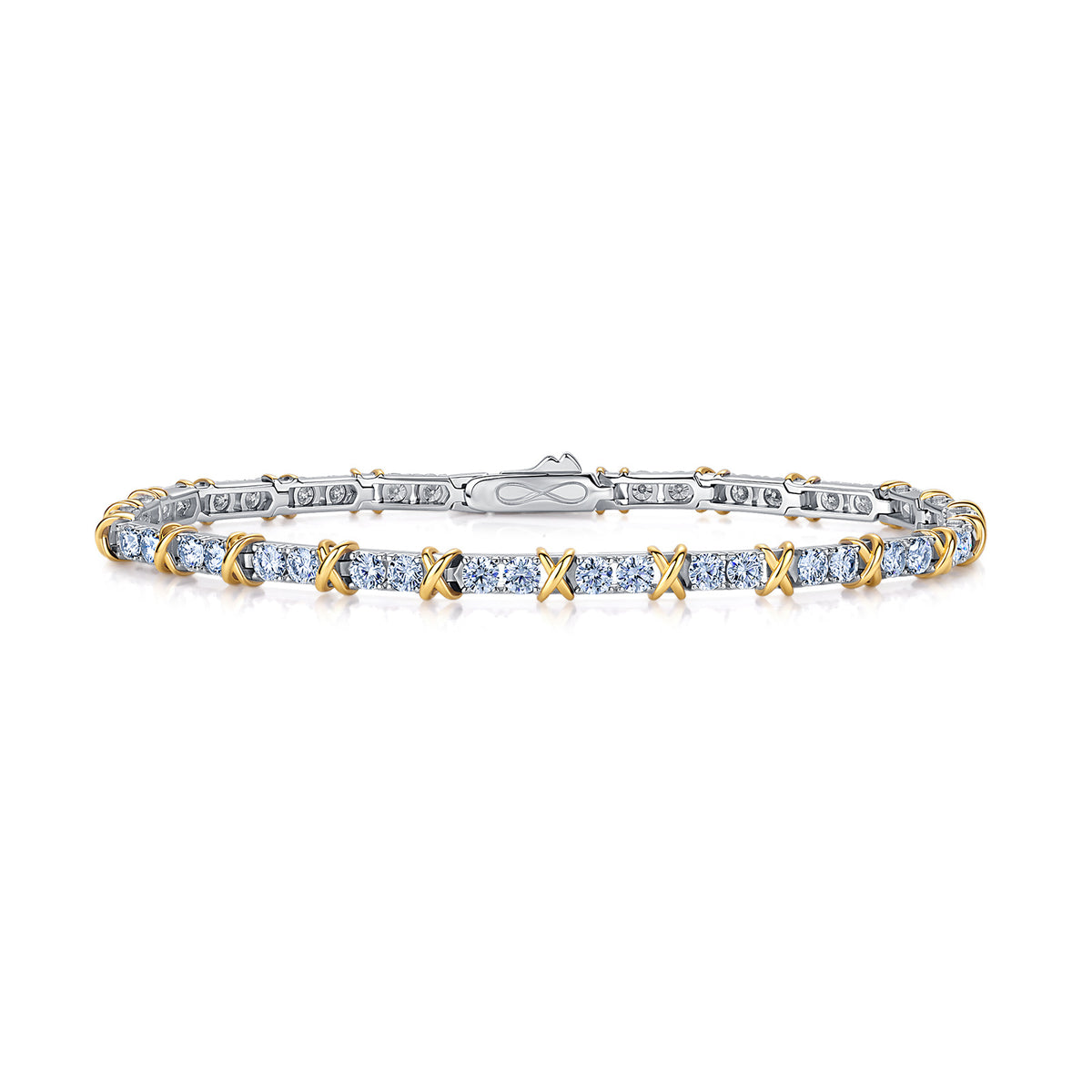 Two-tone hugs and kisses XO moissanite tennis bracelet isolated on white background