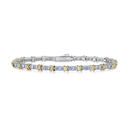 Two-tone hugs and kisses XO moissanite tennis bracelet isolated on white background