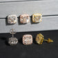 Three-tone iced out asscher cut halo solitaire moissanite stud earrings showing screw back posts and back basket