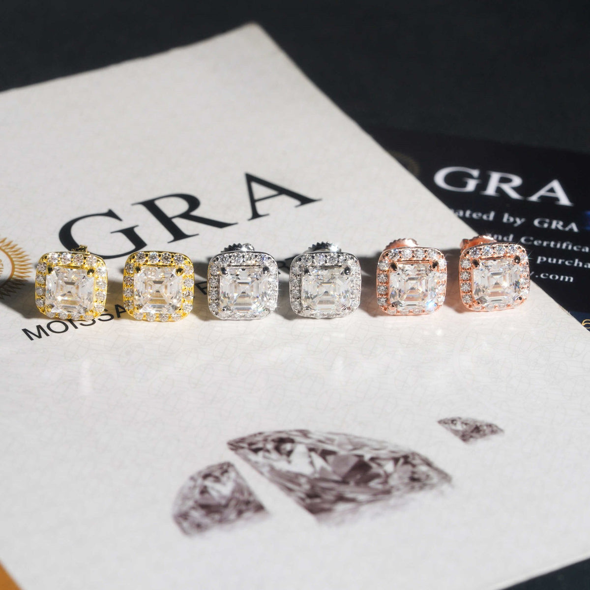 Iced out asscher cut halo solitaire moissanite stud earrings in gold, silver, and rose gold on GRA certificate