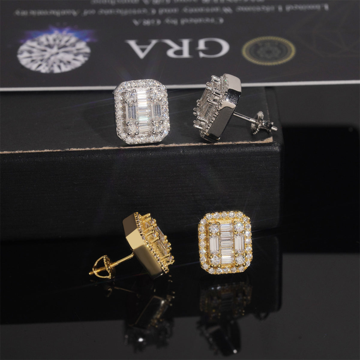 Gold and silver iced out baguette cut halo moissanite stud earrings with screw back post details on reflection glass
