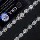 Close up view of silver iced out baguette halo moissanite tennis chain links and double safety box clasp