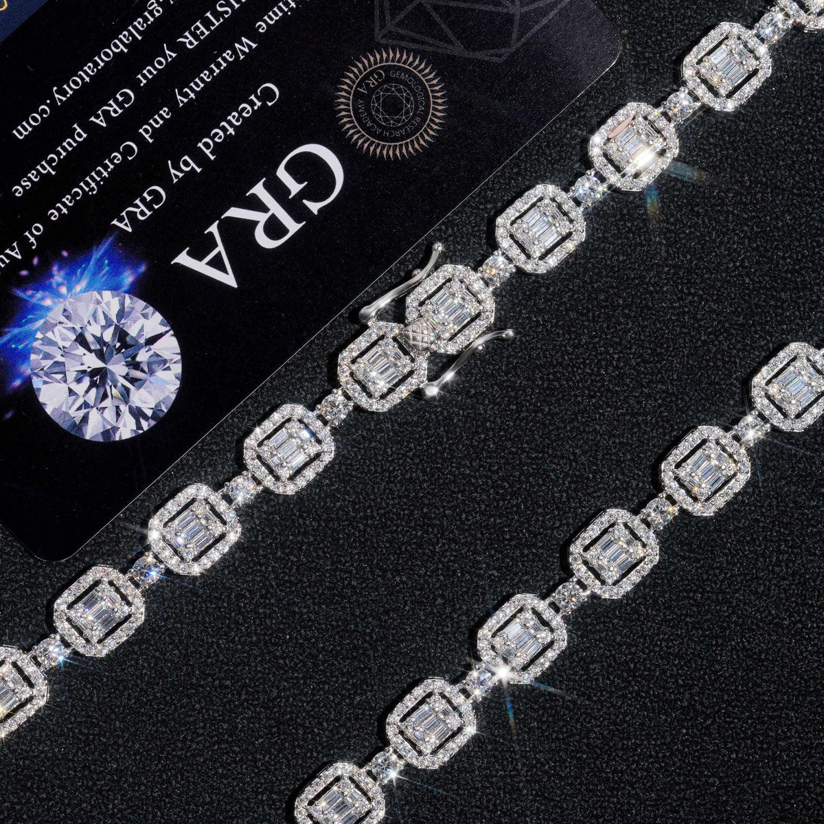 Close up view of silver iced out baguette halo moissanite tennis chain links and double safety box clasp