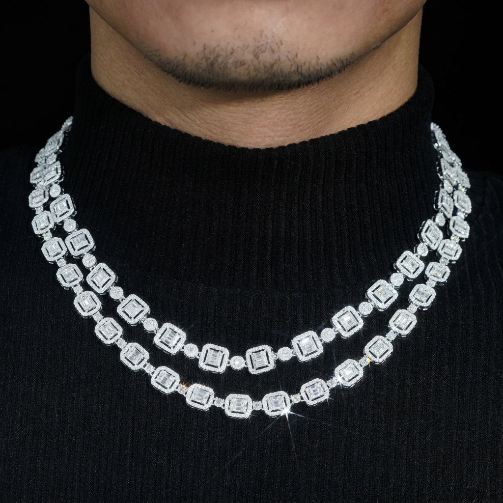 Model wearing layered silver iced out baguette halo and round alternating moissanite tennis chains   