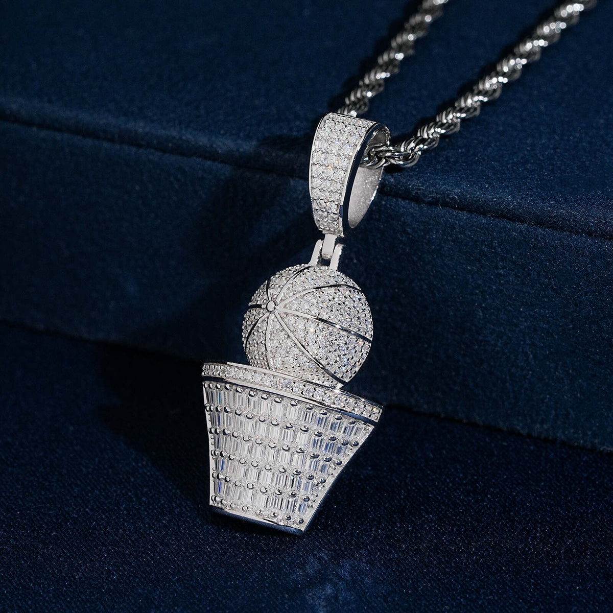Front view showing pave moissanite basketball and net detail on iced out pendant