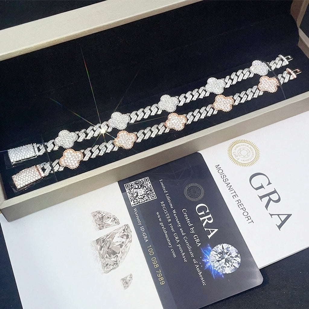 Iced out clover cuban link moissanite bracelets in silver and rose gold displayed with GRA certificate card