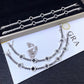 Iced out black enamel and white clover tennis chain moissanite bracelet and necklace set with GRA certificate