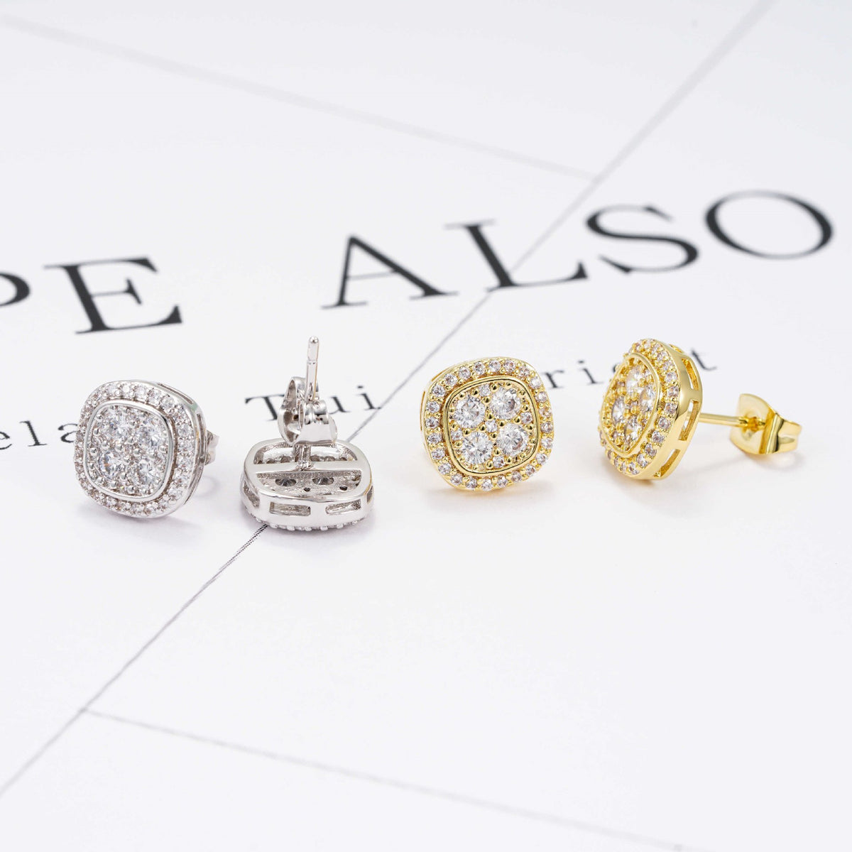 Gold and silver iced out cushion square cluster moissanite stud earrings showing screw back posts and back basket