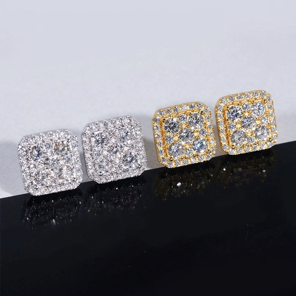Iced out cushion square cluster moissanite stud earrings in silver and yellow gold on reflective card