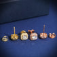 Rose gold and yellow gold iced out cushion square halo solitaire moissanite stud earrings showing posts and screw backs