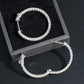 Silver iced out eternity moissanite hoop earrings showing open hinged clasp latch back mechanism
