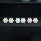 Yellow gold iced out flower 7-stone cluster moissanite stud earrings showing front setting and screw back post