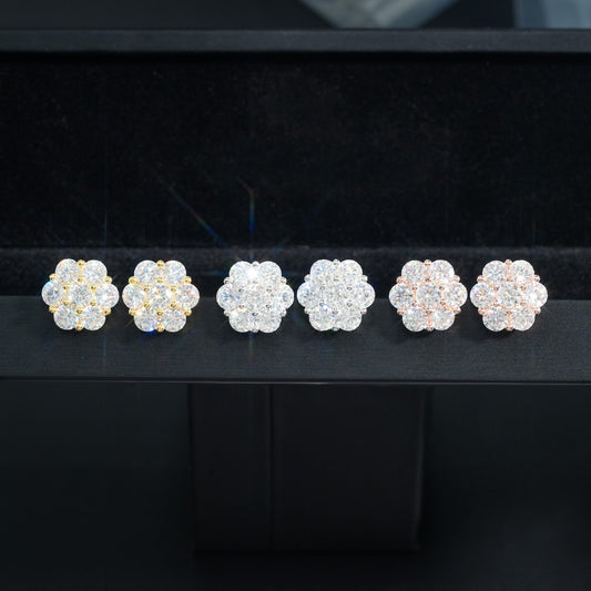 Yellow gold iced out flower 7-stone cluster moissanite stud earrings showing front setting and screw back post