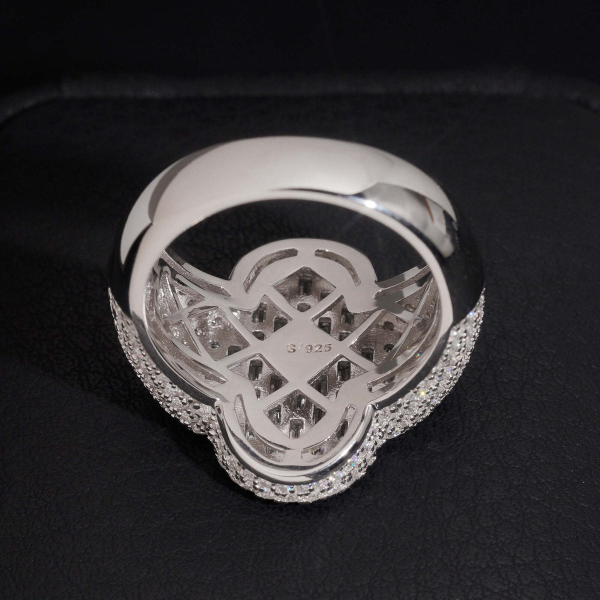 Back view showing solid lattice hollow inner band of four-leaf clover ring