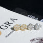 Silver iced out marquise cluster round moissanite stud earrings showing front pave setting and screw back post