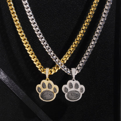 Gold and silver S925 iced out moissanite animal paw print pendants hanging on cuban chains