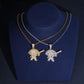 S925 silver iced out moissanite Stewie with gun pendant necklaces displayed on jewelry neck bust