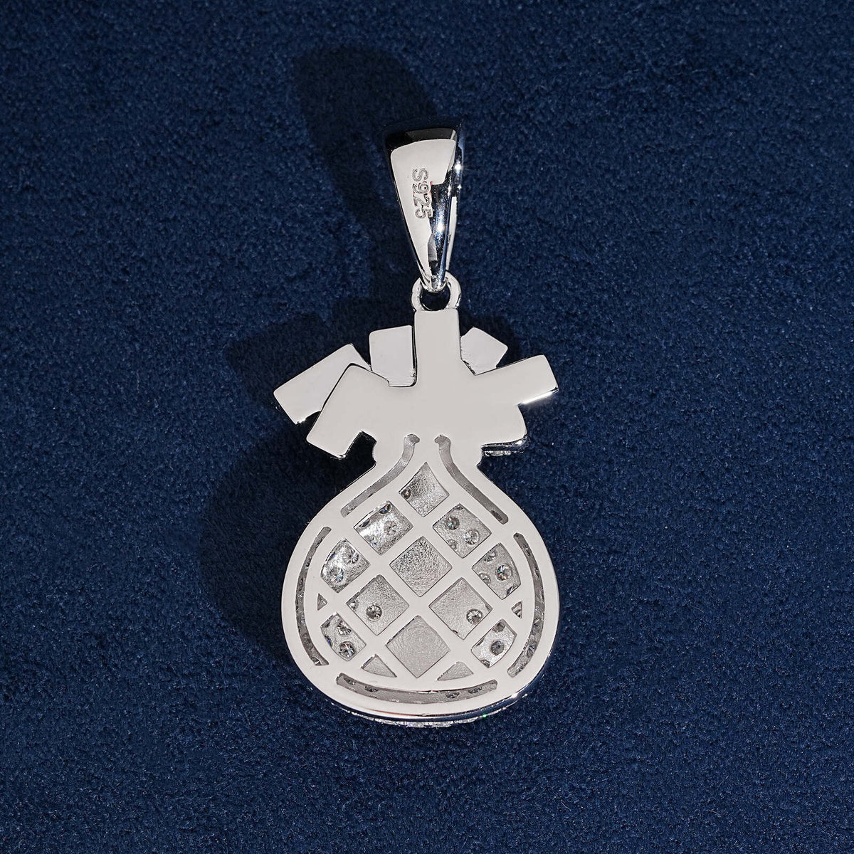 Back view showing lattice hollow pattern of iced out money bag dollar sign moissanite pendant