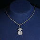 Iced out money bag dollar sign moissanite pendant displayed on jewelry mannequin bust   